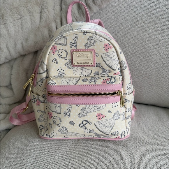 Loungefly Handbags - Loungefly Disney Beauty and The Beast Belle Pink Line Art Backpack